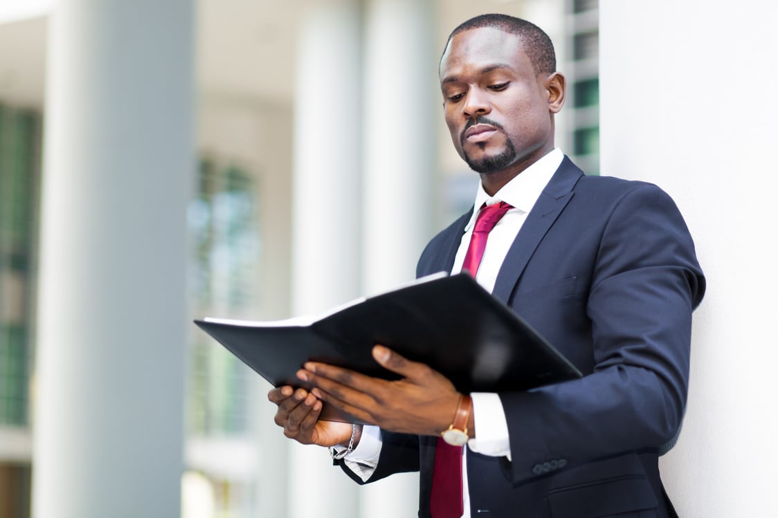 Businessman Reading His Agenda